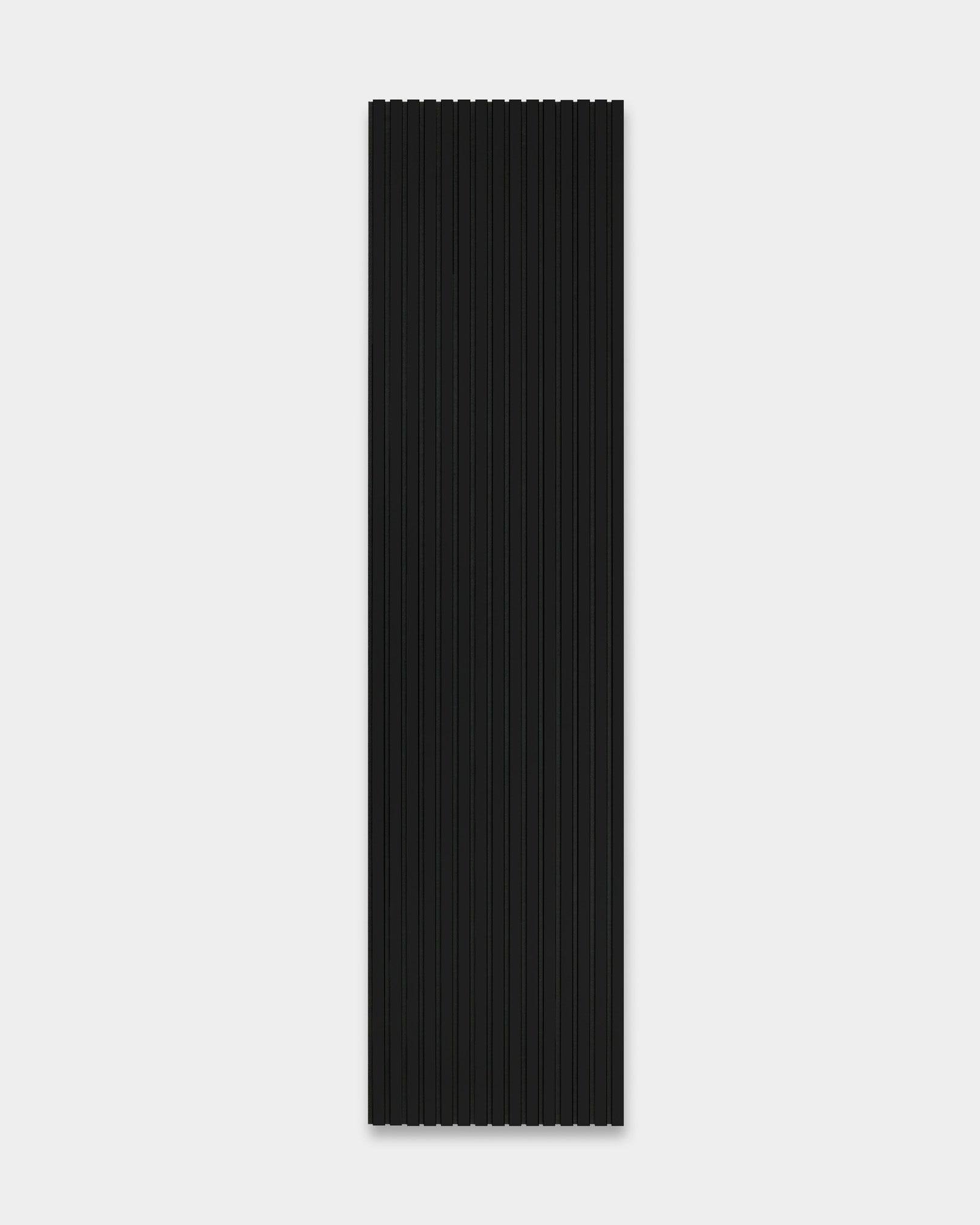WoodUpp Akupanel black acoustic wood panel with evenly spaced vertical ridges displayed against a plain light gray background.